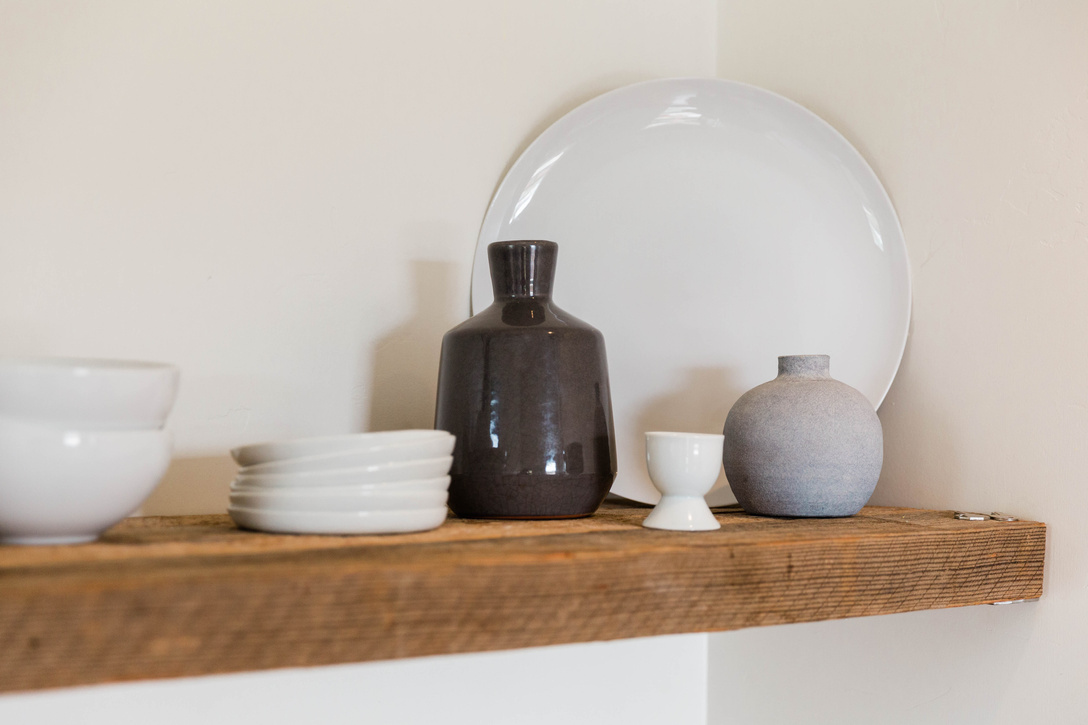 Dishware and Vases on Wooden Shelf